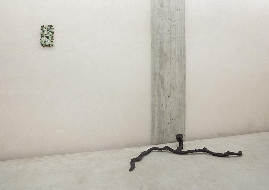 On the floor:
Mole#1 (Ciupinara) (Ed. 1 of 5) 2014 
Epoxy resin, soil, iron oxid 
18 x 160 x 100 cm.